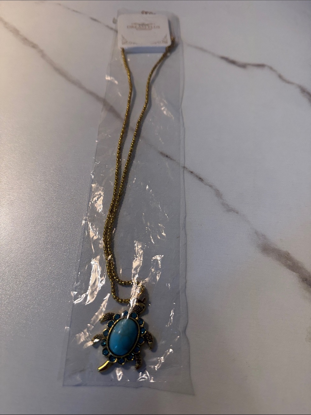 Gold-Tone Turtle Pendant Necklace with Blue Stone Accent